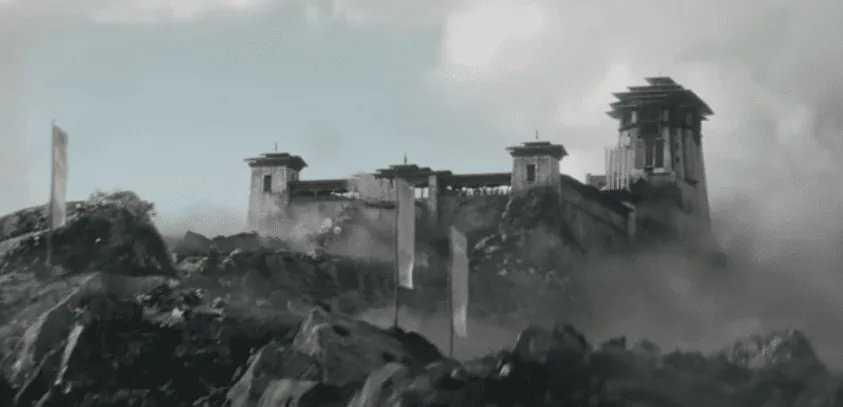 Un large bâtiment cubique ouvert au centre et disposant d'une tour à chaque coin. Il se trouve sur une montagne sans verdure très rocheux où plusieurs banières blanches sont posées. Un escalier montant part de ce bâtiment pour rejoindre le sommet où un bâtiment cubique fermé presque trois fois plus haut et trois fois moins large est perché.