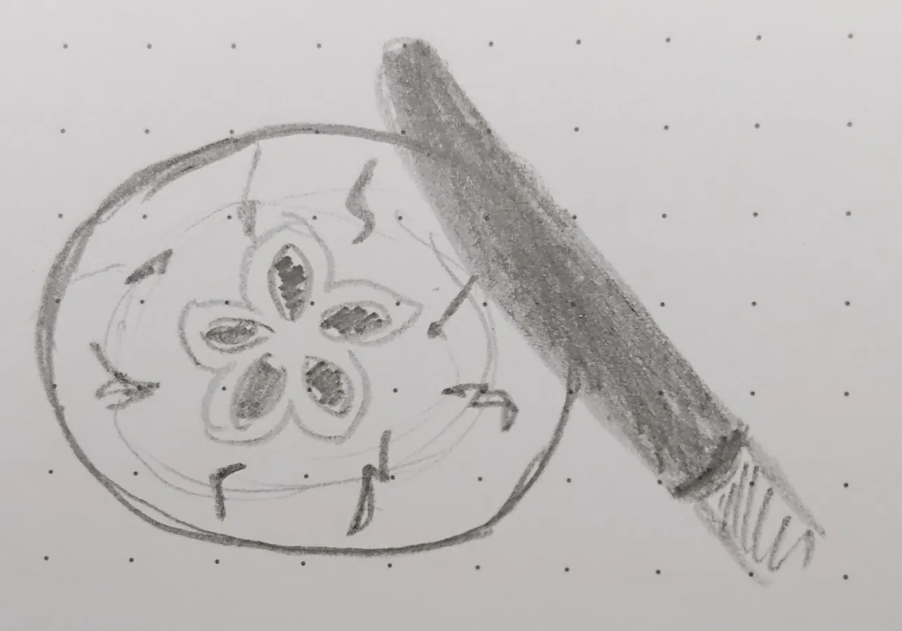 Dessin d'une pomme coupé avec la lame d'un couteau