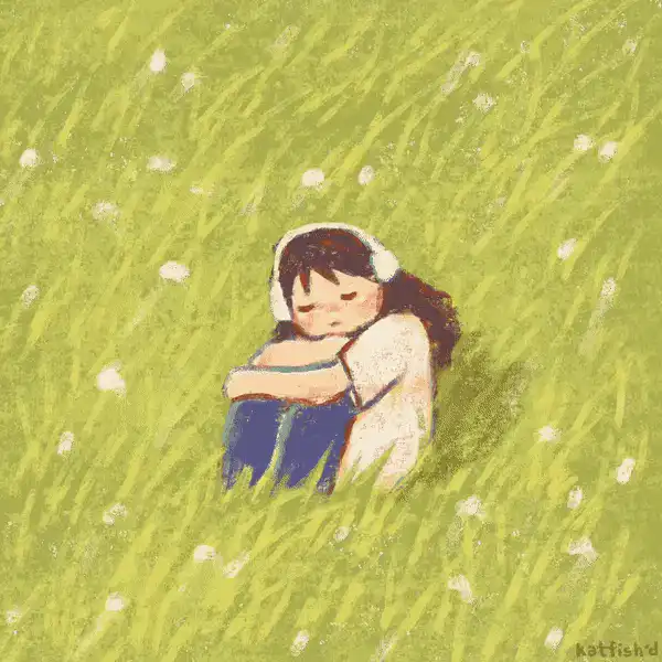 GIF d’une petite fille brune dans les champs qui écoute de la musique